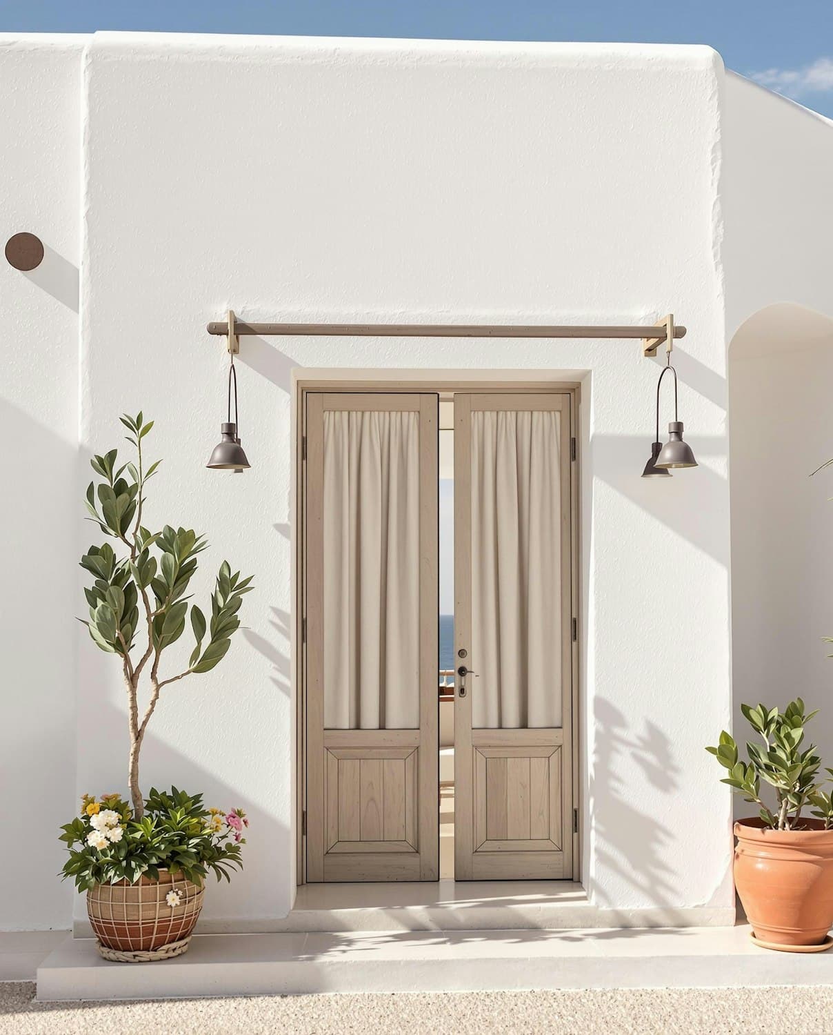 An open timber doorway framed by potted plants and soft daylight